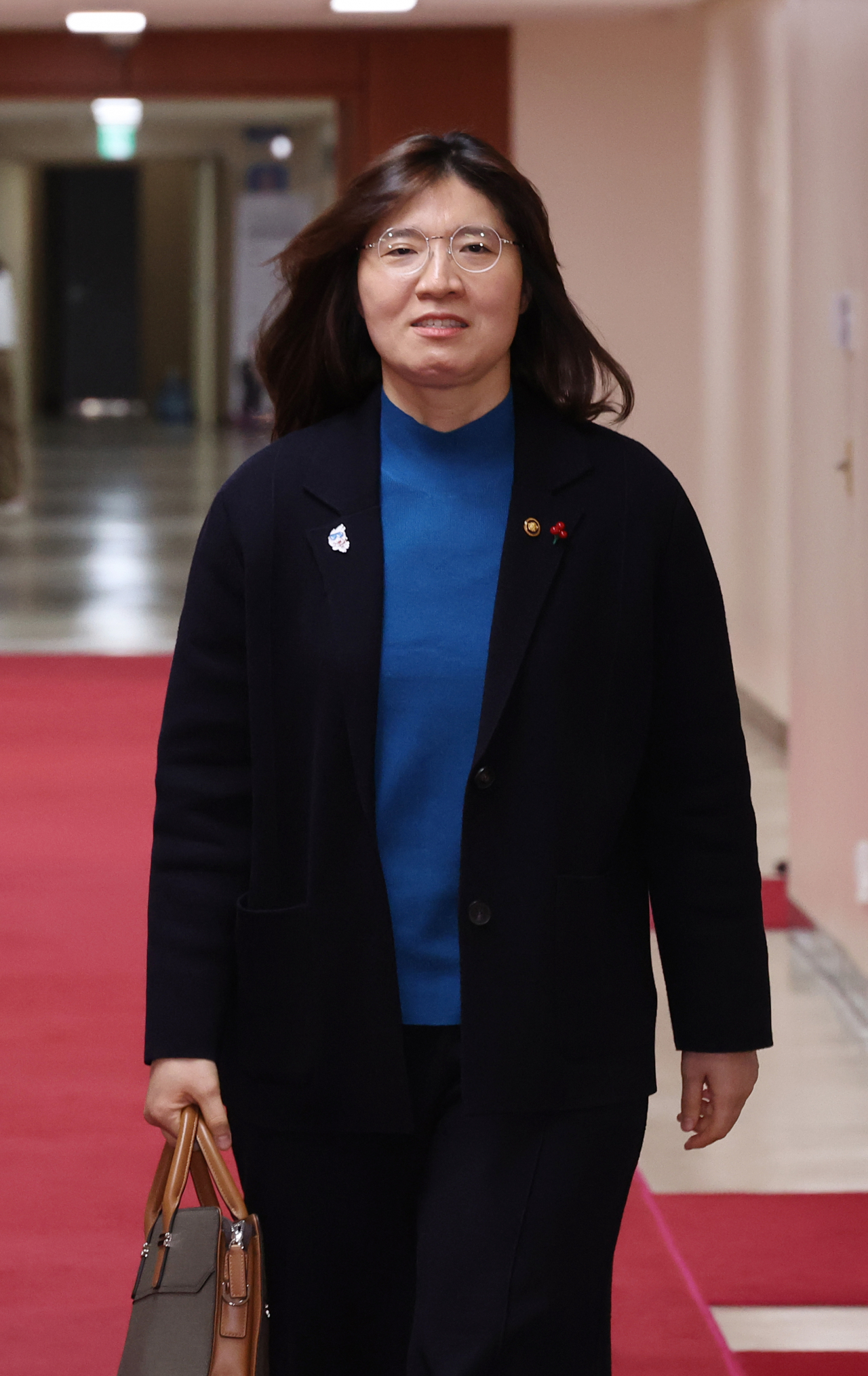 장미란 문화체육관광부 2차관이 서울 종로구 정부서울청사에서 열린 국무회의에 입장하고 있다. [연합]