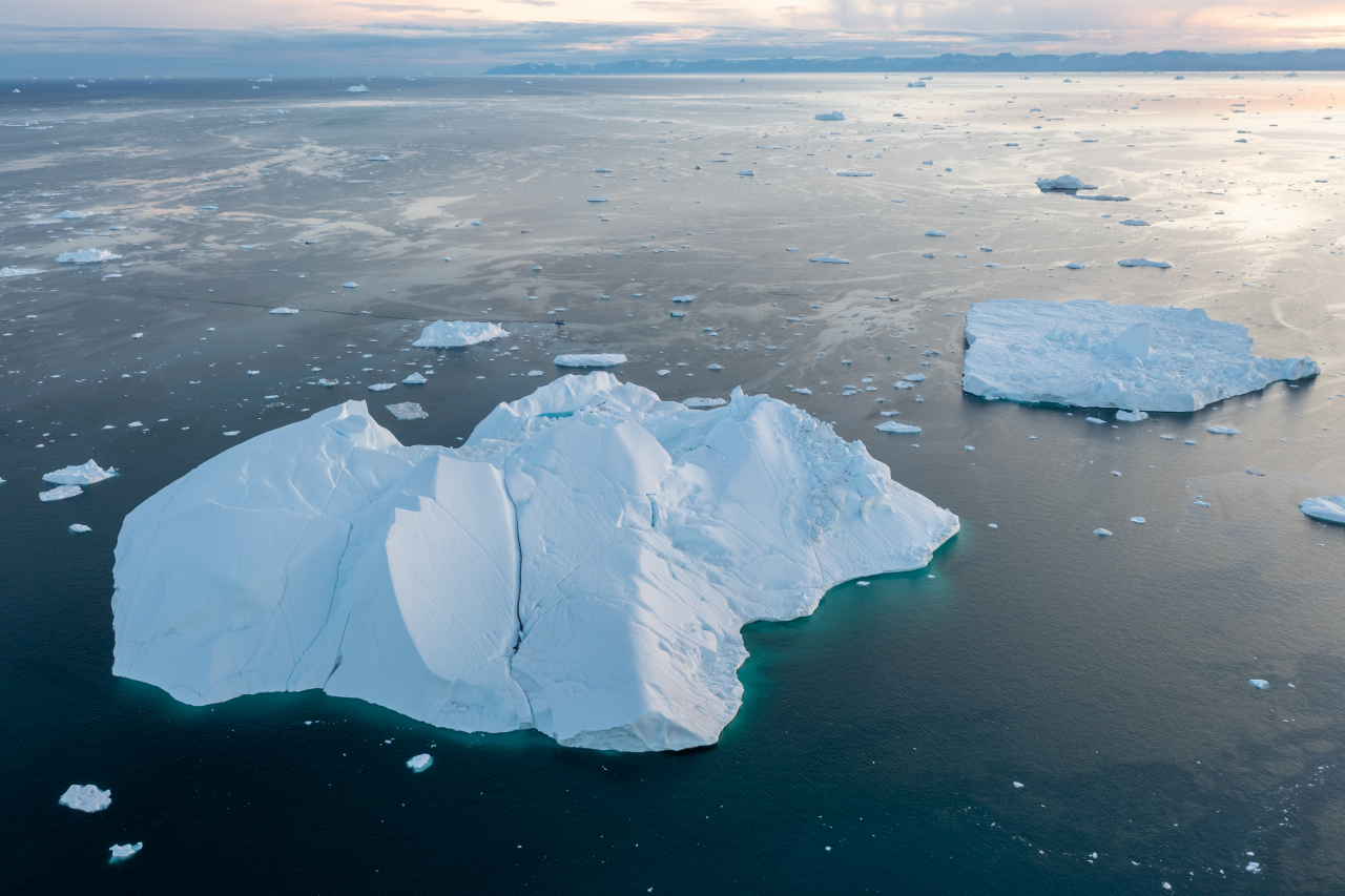 Icebergs float from a melting glacier in Greenland. (Getty Images Bank)