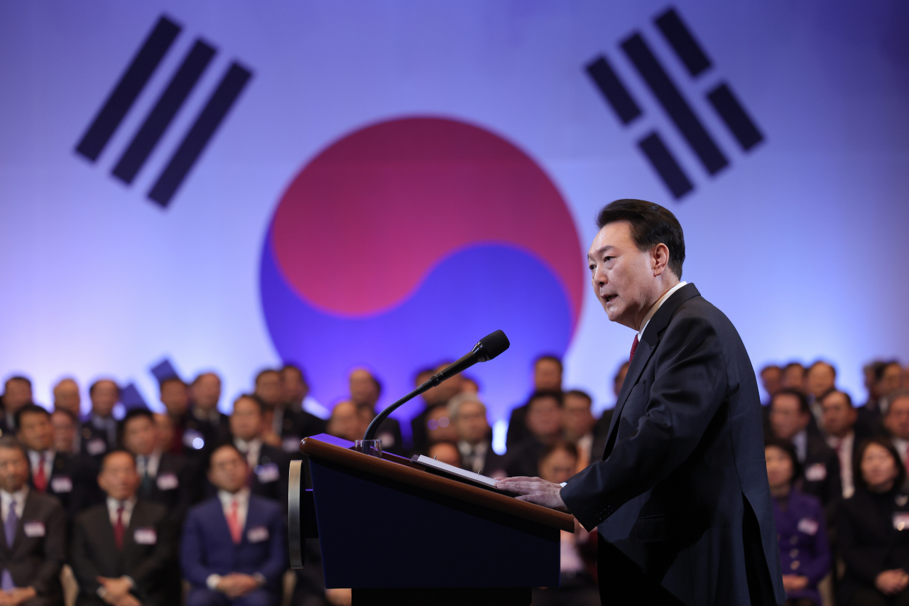 President Yoon Suk Yeol delivers a speech at the New Year gathering of business leaders in Yeouido, Seoul on Tuesday. (Presidential Office)