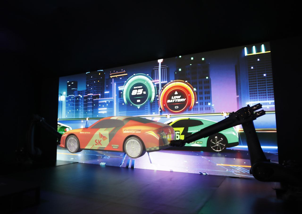 The “Dancing Car” zone at SK Group‘s pavilion at the CES 2024 in Las Vegas highlights various EV technologies. (SK Group)