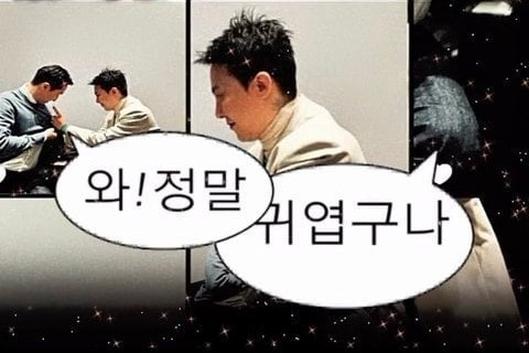 가수 지드래곤이 9일(현지시각) 미국 라스베이거스에서 열린 'CES2024'에서 정기선 HD현대 부회장의 가슴에 브로치를 달아주고 있다. [지드래곤 인스타그램]