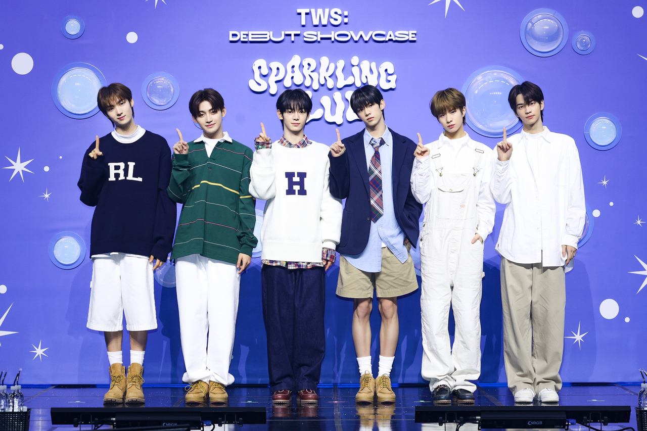 TWS makes its debut with the release of its first EP, "Sparkling Blue," at a press conference in Seoul on Monday. (Pledis Entertainment)