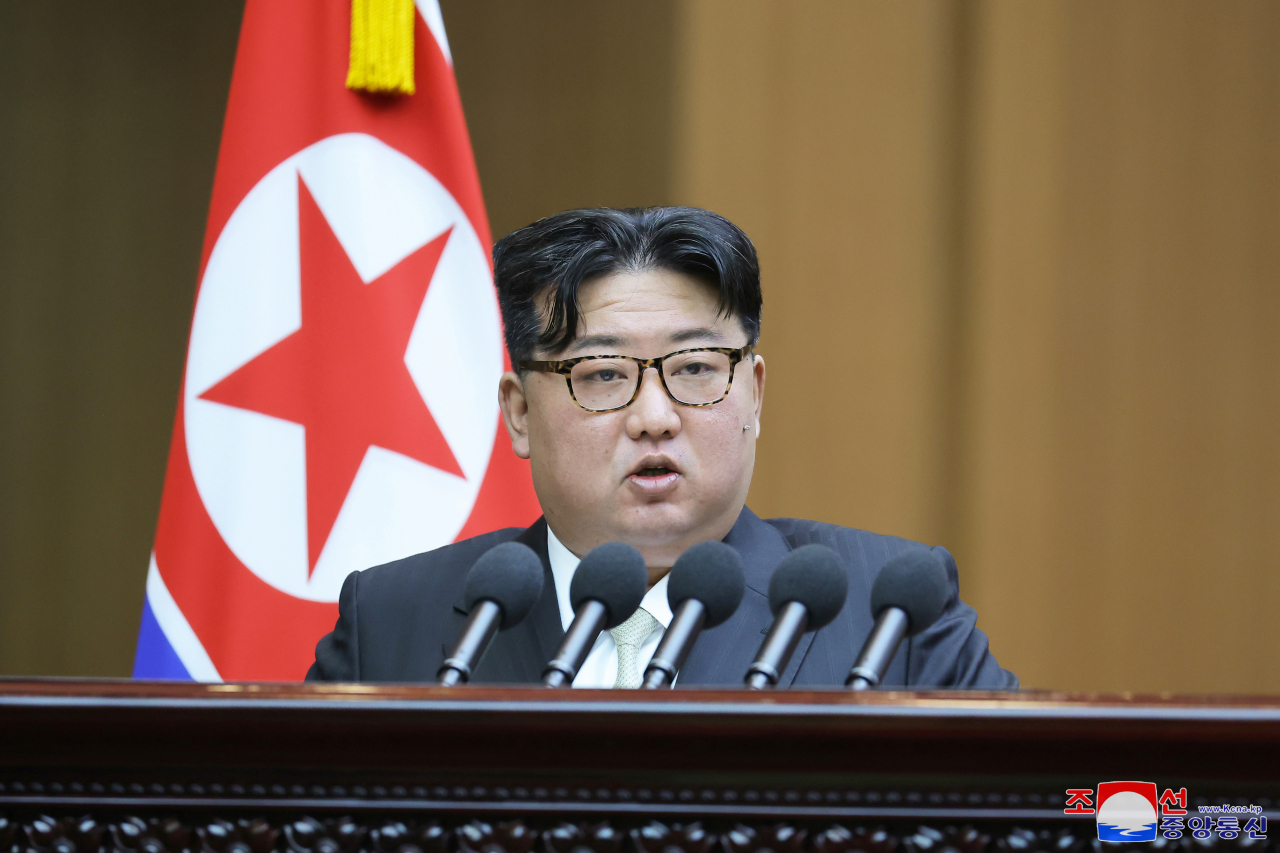 This photo, on Jan. 16, 2024, shows the North's leader Kim Jong-un delivering a speech at the 10th session of the 14th Supreme People's Assembly held in Pyongyang the previous day. (KCNA)