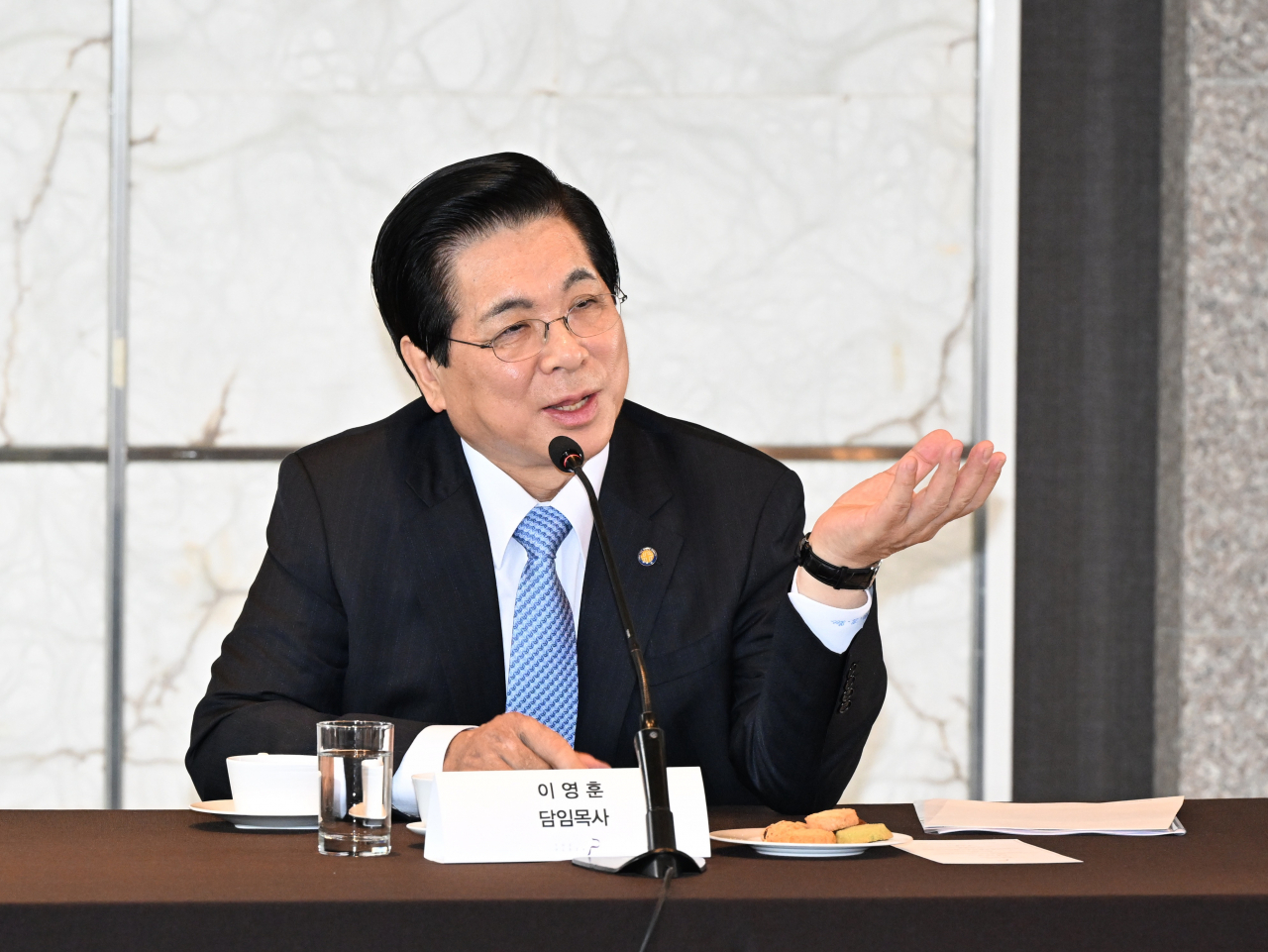 이영훈 여의도순복음교회 담임목사가 14일 서울 중구 한 호텔에서 열린 기자간담회에서 발언을 하고 있다. [여의도순복음교회 제공]