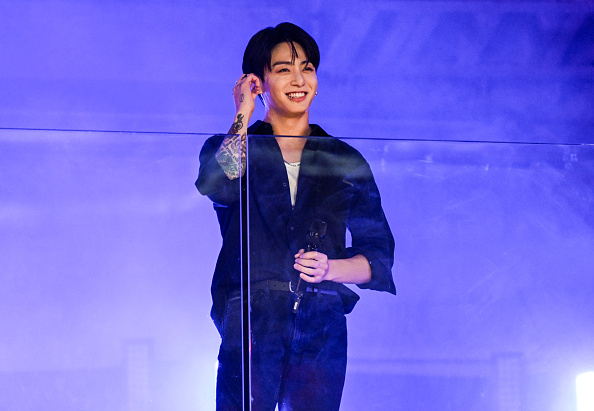 Jungkook performs during a surprise concert in Times Square on November 9, 2023 in New York City. (Daniel Zuchnik - Getty Images)