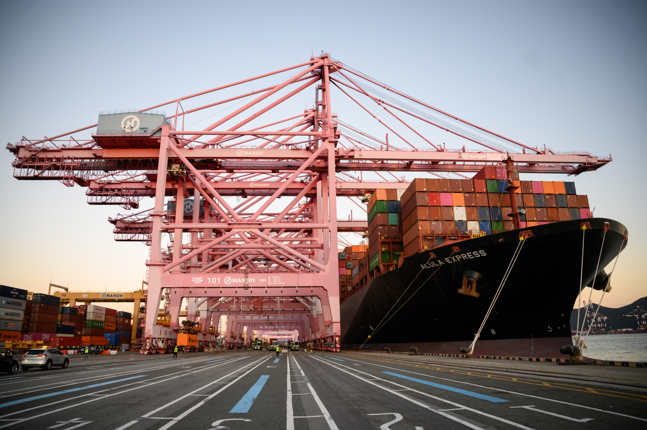 Shipping containers are stacked at a pier in the southeastern port city of Busan. (Getty Images)