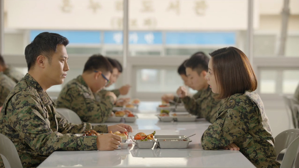 A scene from the TV series "Descendants of the Sun," starring Jin Goo (left) and Kim Ji-won (KBS)