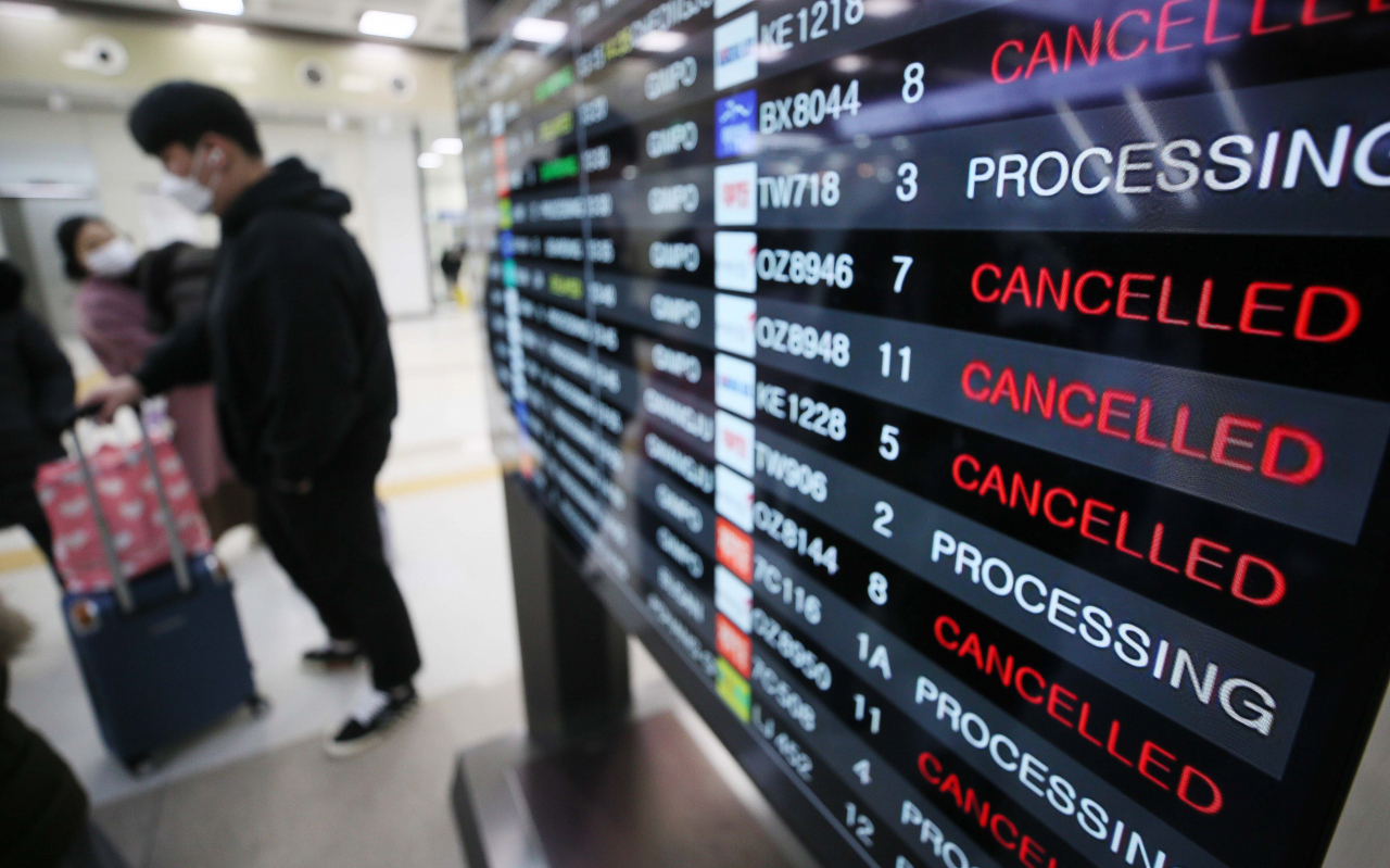 제주공항 항공편 운항 현황판. [연합]