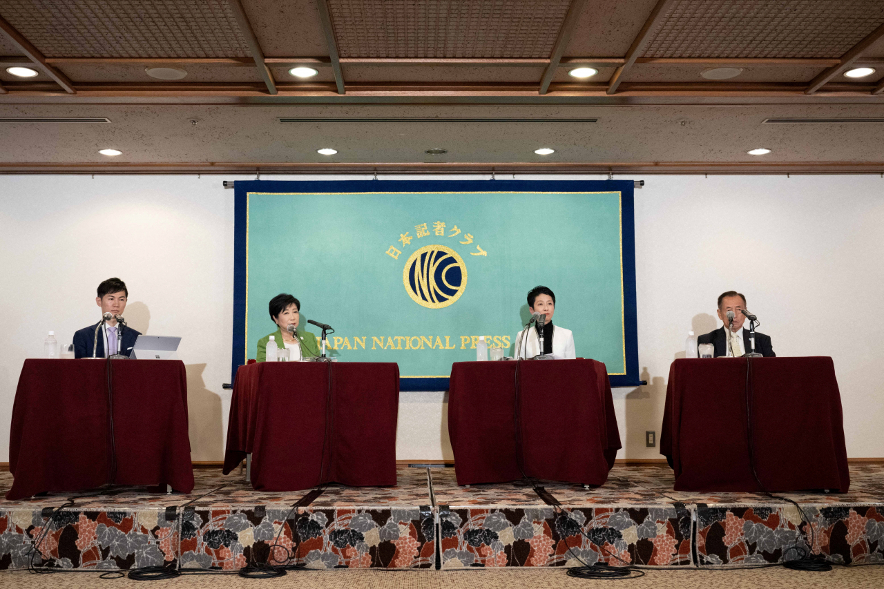 19일 일본 도쿄에서 도쿄도지사 선거 후보자들이 기자회견을 하고 있다. [로이터]