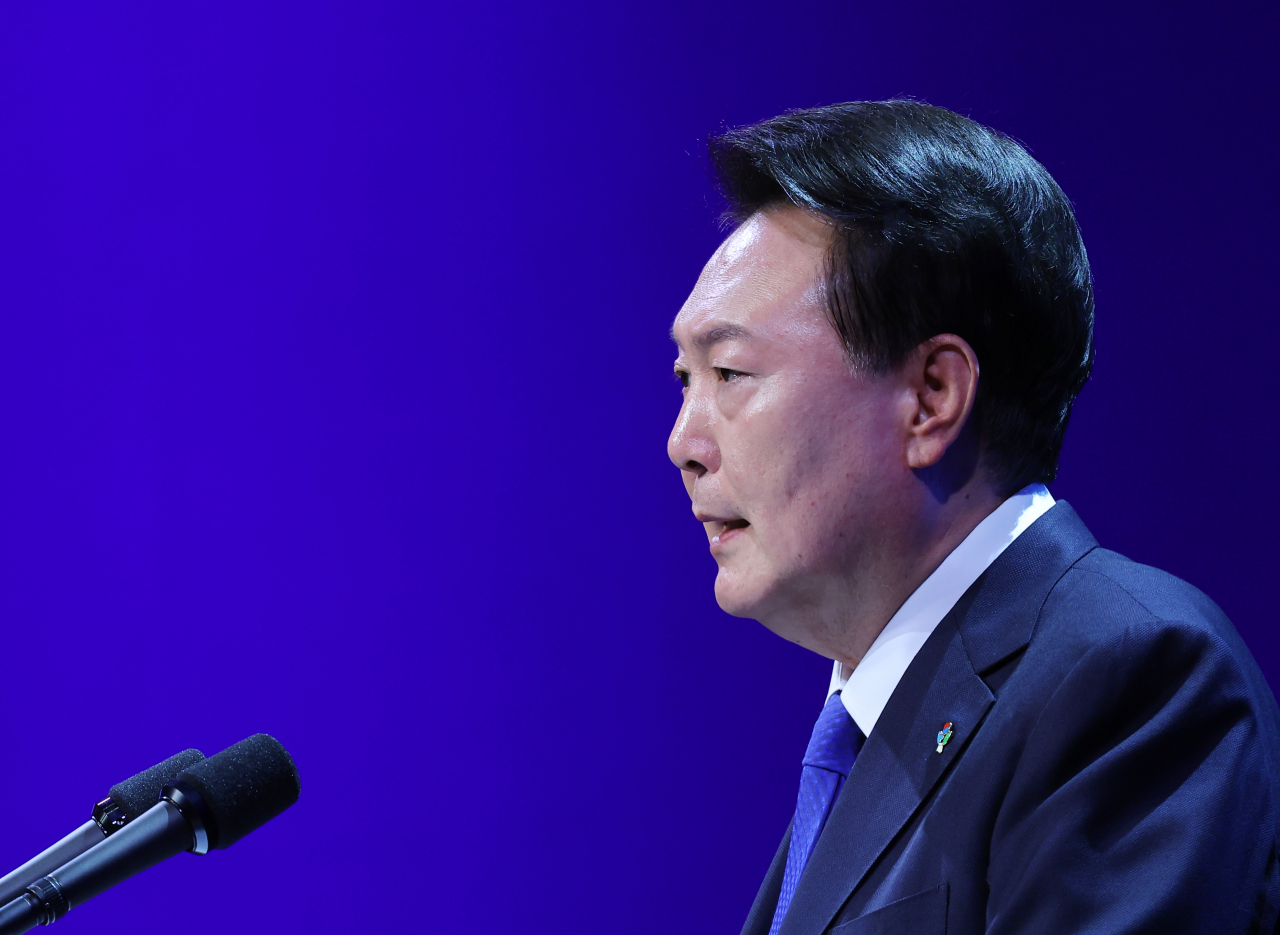 President Yoon Suk Yeol delivers an address at a ceremony to commemorate the 74th anniversary of the outbreak of the Korean War on Tuesday. (Pool photo via Yonhap)