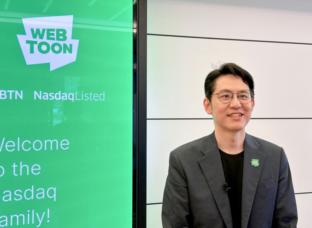 김준구 웹툰엔터테인먼트 대표이사가 지난달 27일(현지시간) 뉴욕증시 상장식 후 미국 뉴욕 나스닥 빌딩에서 가진 기자간담회에서 발언하고 있다. [연합]