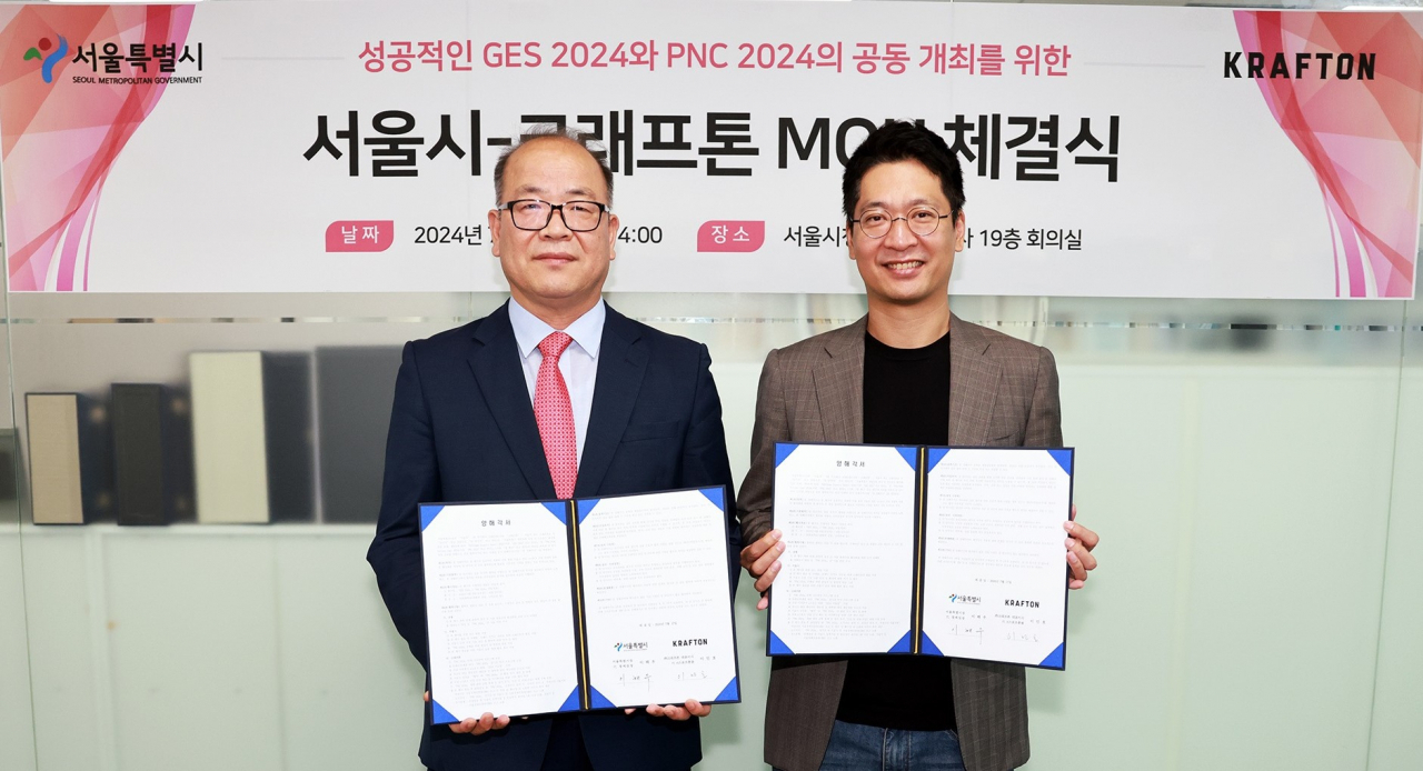 서울시는 게임 개발사 크래프톤과 함께 게임·e스포츠 산업 성장을 돕고 ‘e스포츠 종주도시’라는 위상을 도모하는 행사 게임·e스포츠서울(Game·e-Sports·Seoul) 2024(GES 2024)를 오는 9월 개최한다. 이해우 서울시 경제정책실장과 이민호 크래프톤 e-스포츠 총괄이 협약 후 기념촬영하고 있다.[서울시 제공]