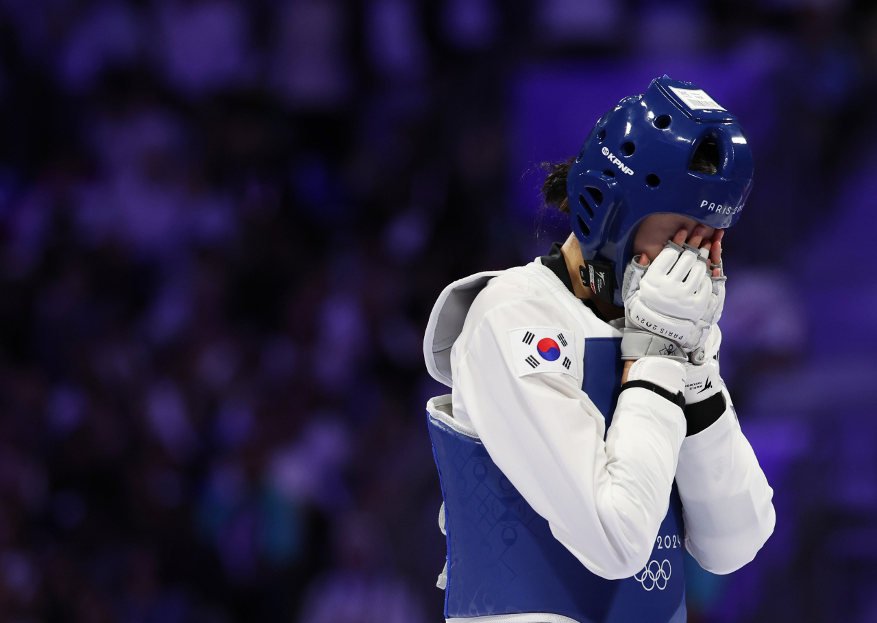 8일(현지시간) 프랑스 파리 그랑팔레 태권도경기장에서 열린 2024 파리 올림픽 태권도 여자 57㎏급 결승에서 이란의 나히드 키야니찬데에게 승리한 김유진이 환호하고 있다. [연합]