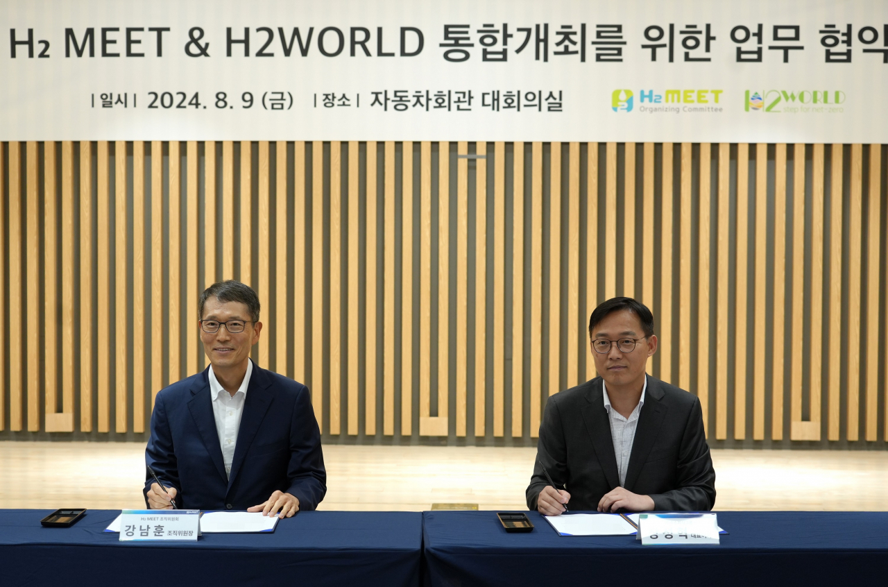 강남훈(왼쪽) H2MEET 조직위원장과 장성혁 H2WORLD 조직위원장. [H2MEET 제공]
