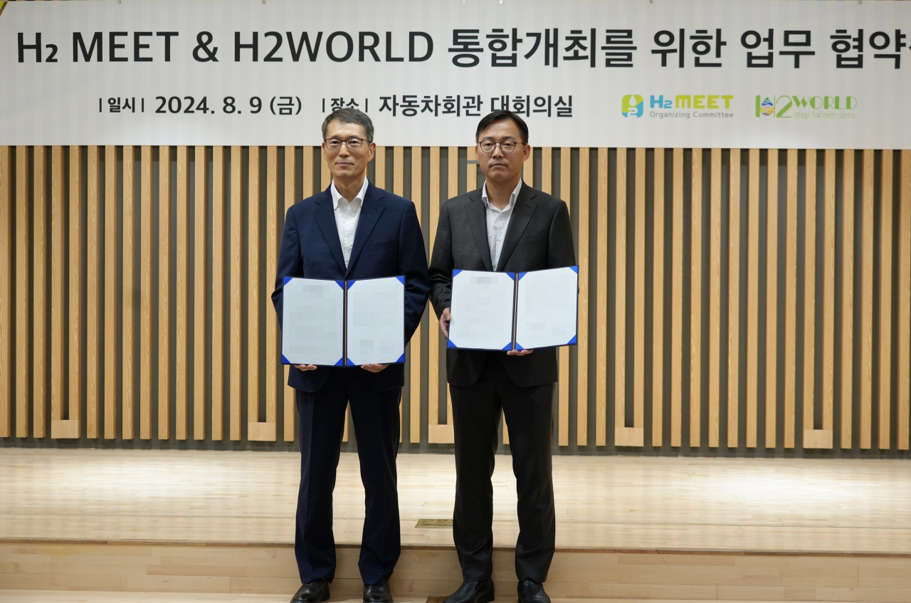 강남훈(왼쪽) H2MEET 조직위원장과 장성혁 H2WORLD 조직위원장. [H2MEET 제공]