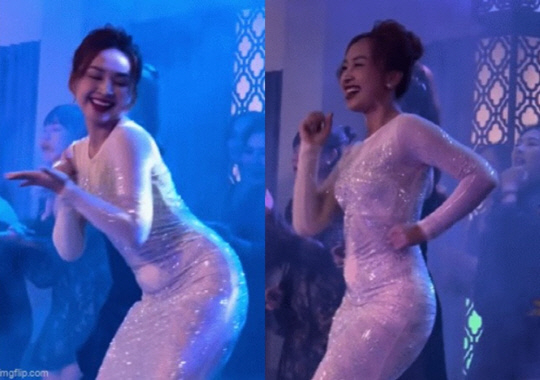 베트남의 한 결혼식장에서 화려한 드레스를 입고 유쾌하게 춤추는 여성 영상이 현지에서 화제가 됐다.〈베트남 매체 'Docnhanh' 보도 캡처〉