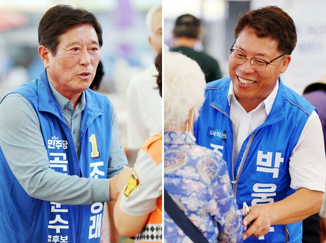 지난달 13일 오전 전남 곡성기차마을전통시장에서 10·16 곡성군수 재선거에 출마한 더불어민주당 조상래 후보(왼쪽)와 조국혁신당 박웅두 후보(오른쪽)가 상인들과 인사하고 있다. [연합]