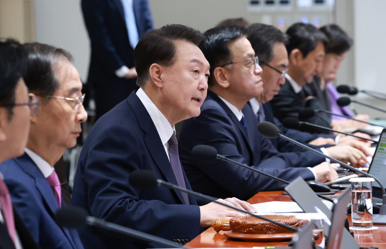 President Yoon Suk Yeol (2nd from left) speaks during a Cabinet meeting held at the presidential office on Tuesday. (Yonhap)