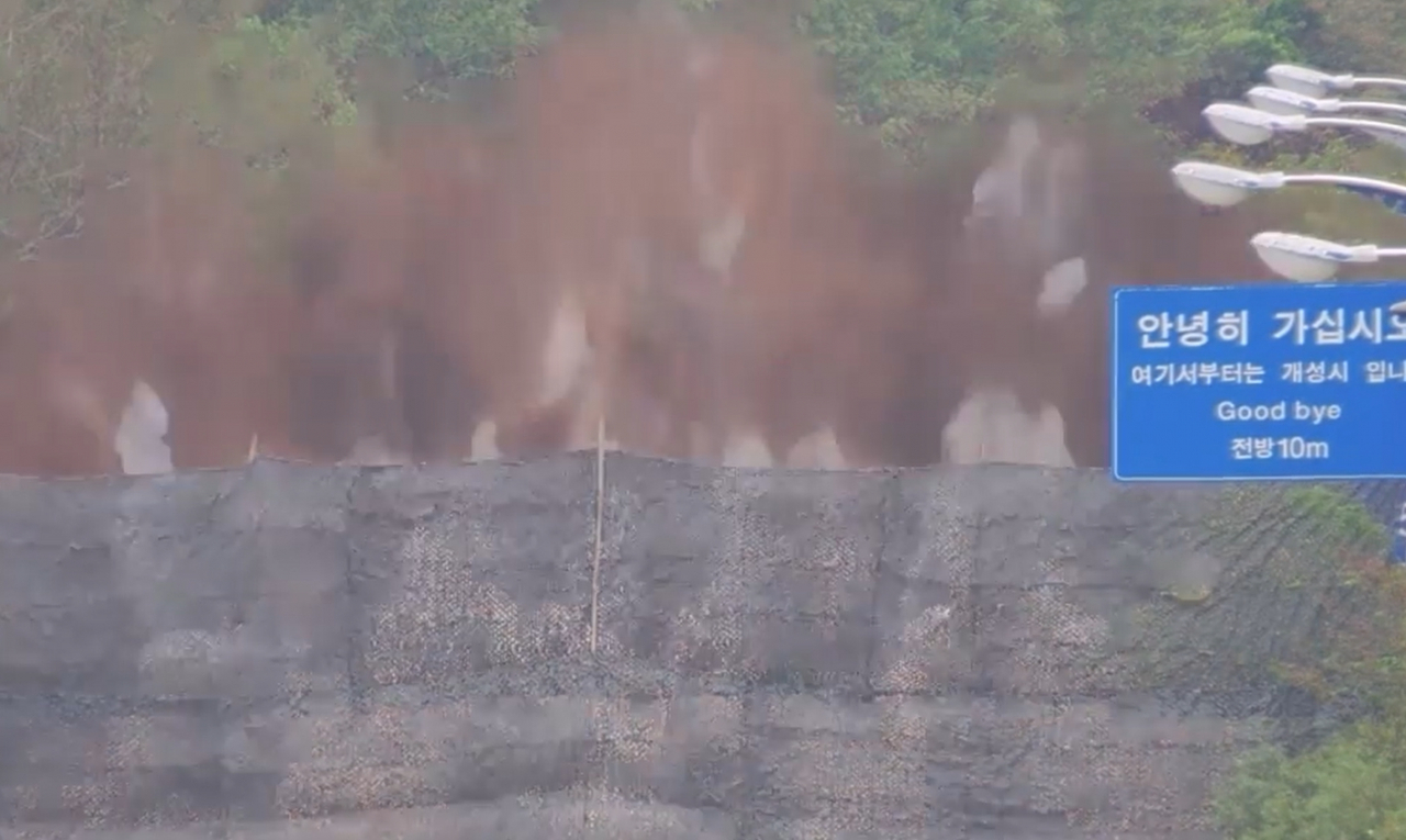 Closed-circuit TV footage of North Korean military exploding parts of inter-Korean roads on Tuesday. (South Korean Joint Chiefs of Staff)