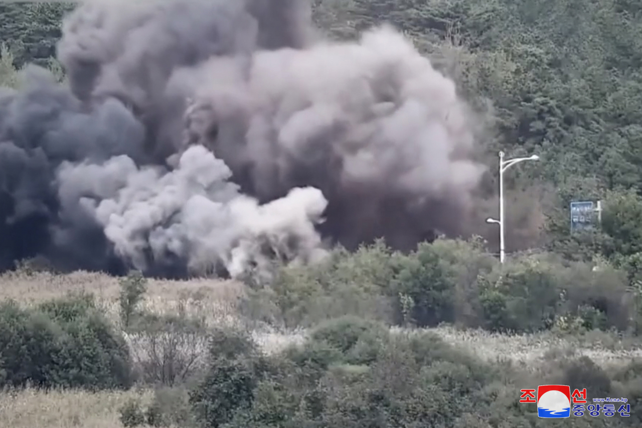 North Korea blows up a railway connected to the South on Oct. 15. (Yonhap-Korea Central News Agency)