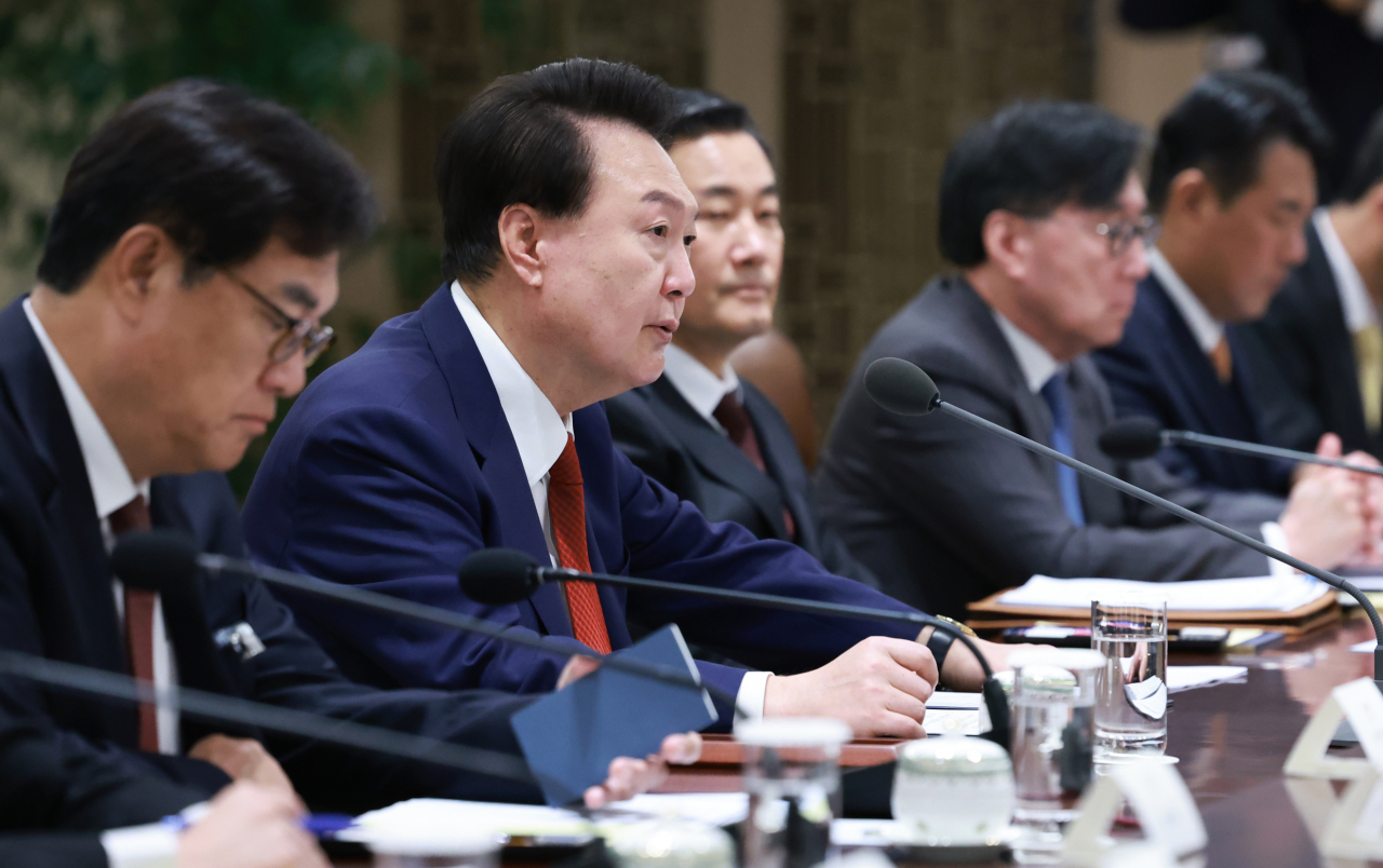 President Yoon Suk Yeol convenes a meeting with senior government officials and presidential aides at the presidential office in Seoul on Sunday, to discuss economic and security implications of a second Trump administration. (Yonhap)
