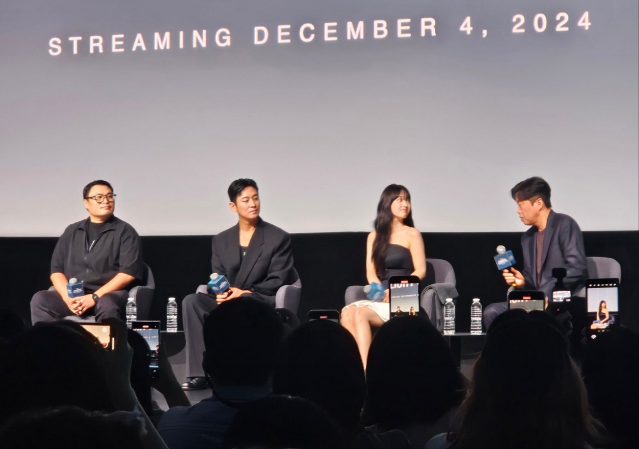 (From left) Kang Full, scriptwriter of "Light Shop," actors Ju Ji-hoon, Park Bo-young and the director of "Light Shop" Kim Hee-won are seen sitting during a press conference held in Singapore on Wednesday. (Lee Yoon-seo/The Korea Herald)
