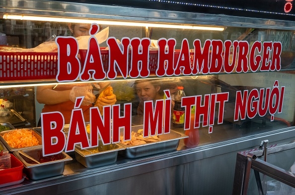 Preparing Vietnamese sandwiches, Kontun, Vietnam