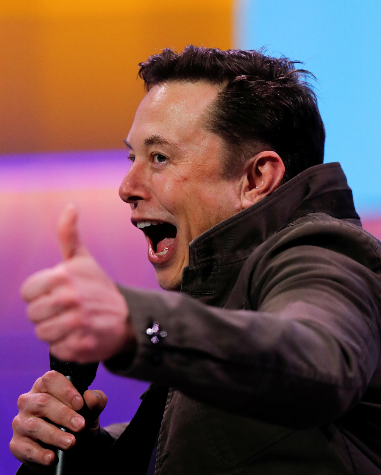 SpaceX owner and Tesla CEO Elon Musk gestures during a conversation with legendary game designer Todd Howard at the E3 gaming convention in Los Angeles