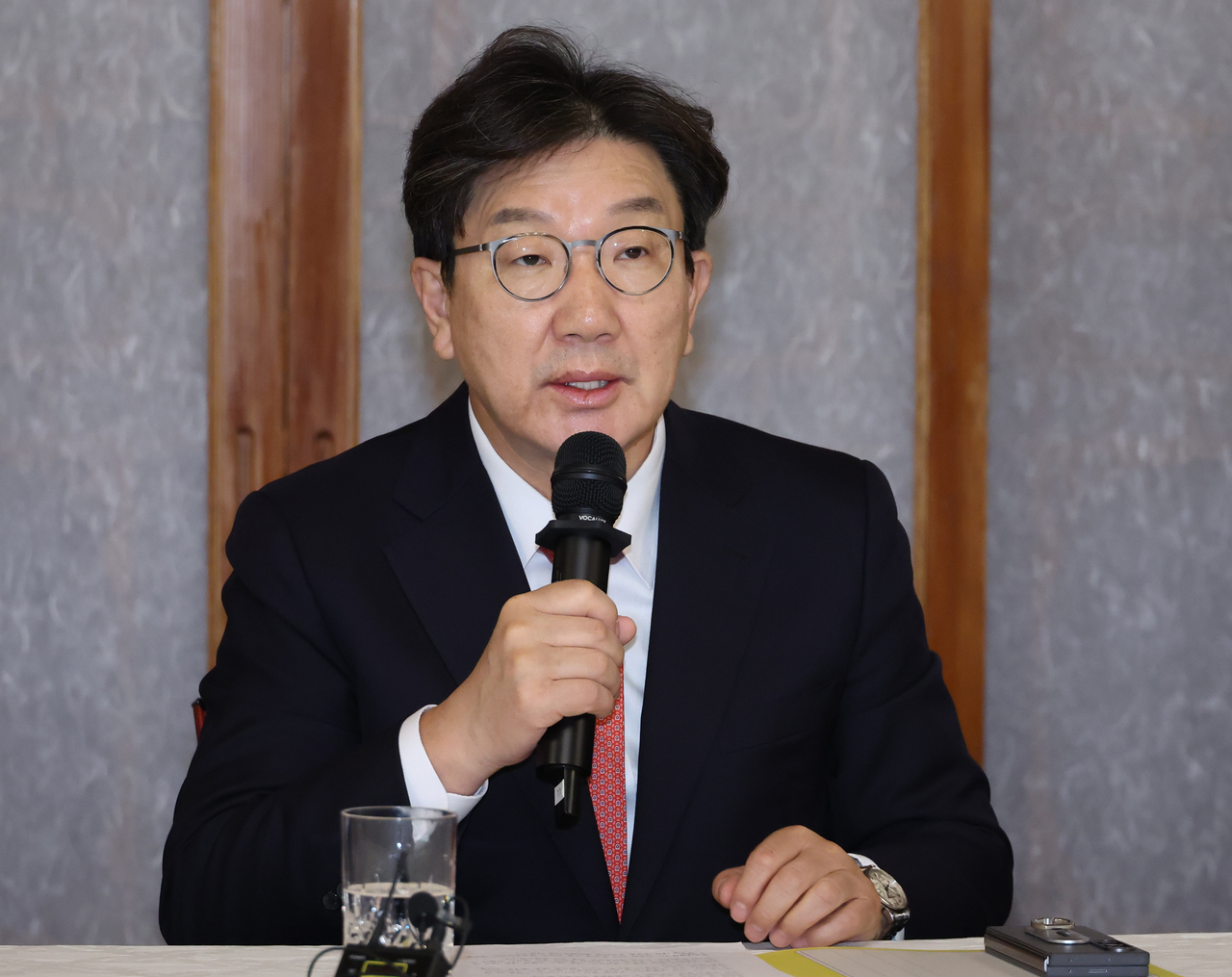 Rep. Kweon Seong-dong,  floor leader and the acting chair of the ruling People Power Party, speaks at a high-level meeting with the government on Friday. (Yonhap)