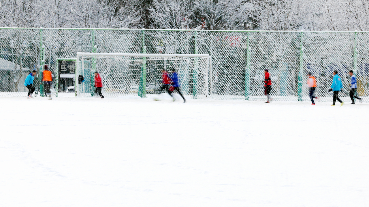 People are playing soccer at the Chonnam National University in Gwangju on Saturday. (Yonhap)