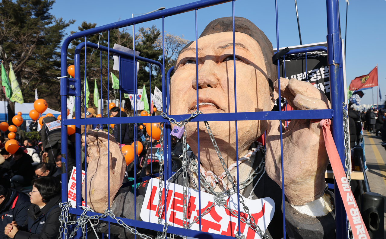 Protesters call for the impeachment of South Korean President Yoon Suk Yeol in front of National Assembly in Seoul on Dec. 14 . (Getty Images)