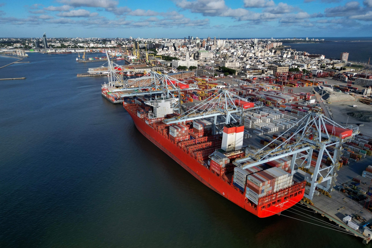 Aerial view showing the Panamanian-flagged Cap San Maleas container ship while unloading containers at the Cuenca del Plata Terminal in the port of Montevideo, on January 6, 2025.  [AFP]