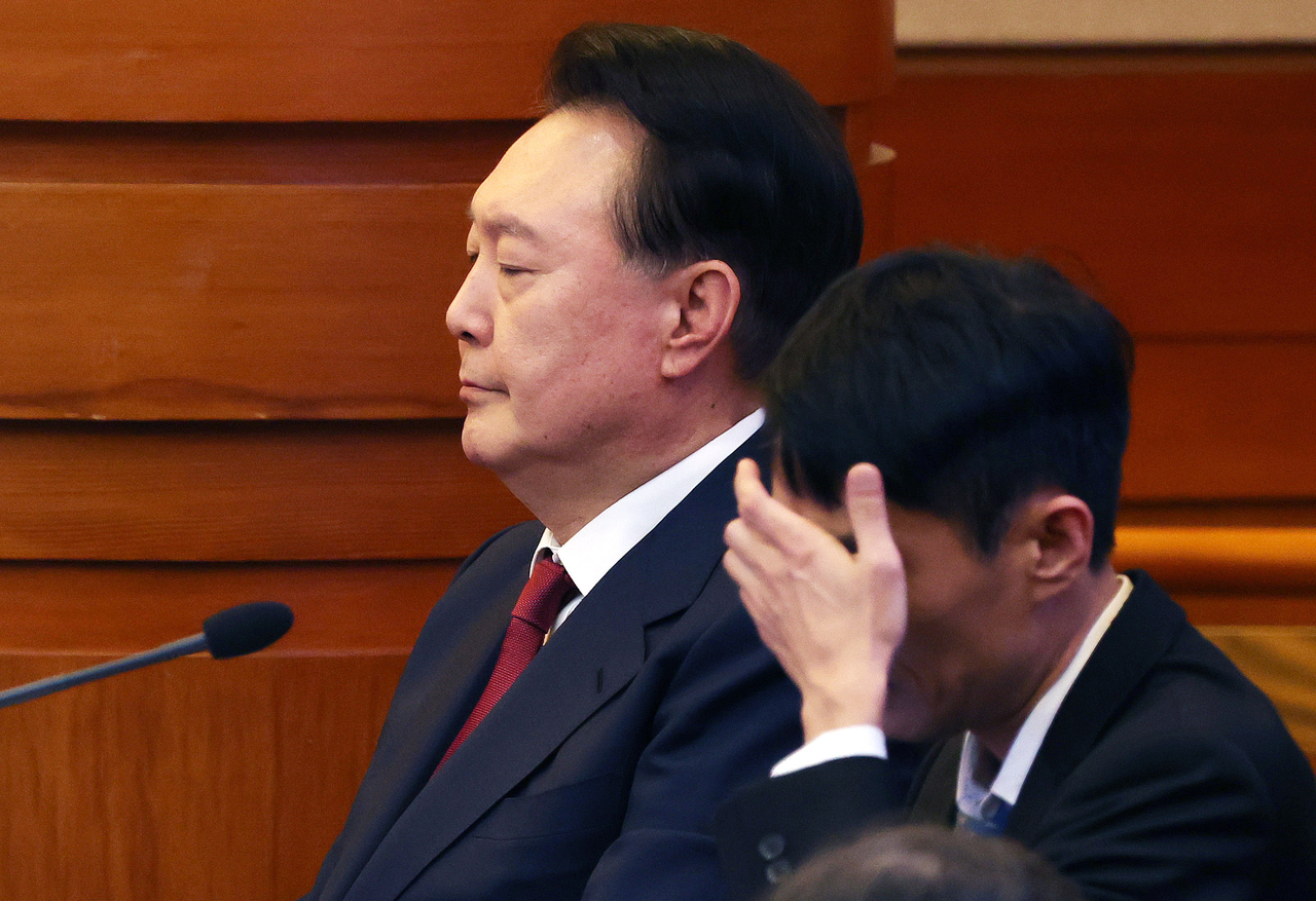 Impeached President Yoon Suk Yeol attends an impeachment hearing at the Constitutional Court on Jan. 23. (Yonhap)