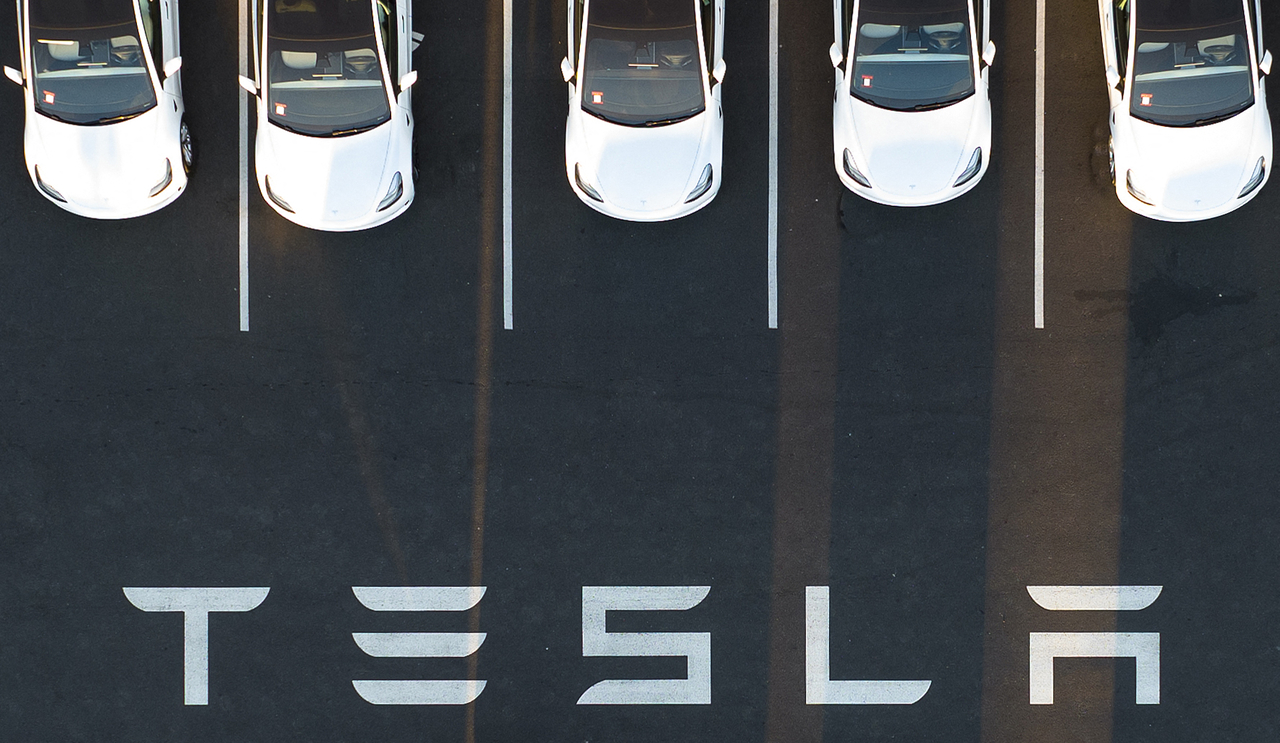 Air view shows cars parked at the Tesla Fremont factory in Fremont, California, USA. (AFP)