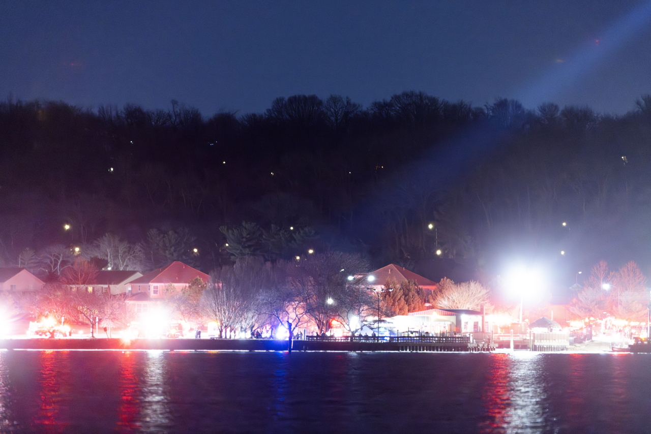 Rescue teams search the Potomac River after a commercial airplane reportedly collided with a military helicopter on approach to Ronald Reagan National Airport in Washington, DC, on Wednesday. (EPA)