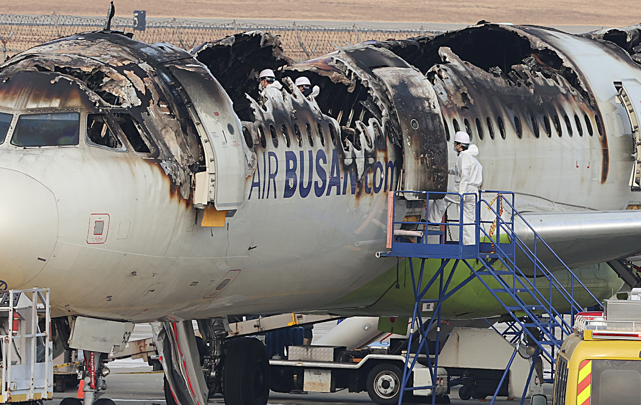 The Air Busan plane set ablaze in Tuesday's fire is seen in this photo taken on Friday at the Gimhae International Airport in Busan. (Yonhap)