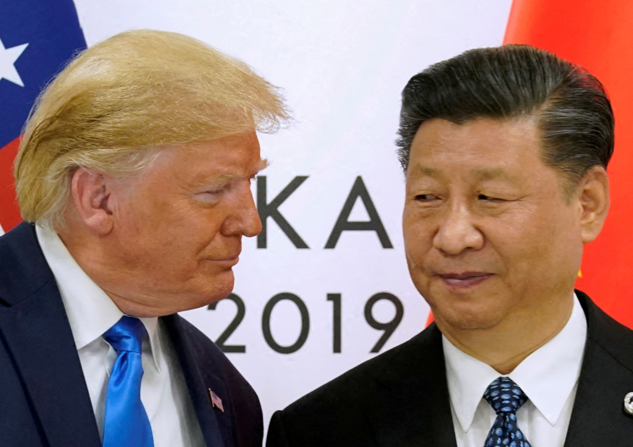 지난 2019년 일본 오사카에서 열린 G20 정상회의에서 만난 도널드 트럼프(왼쪽) 미국 대통령 당선인과 시진핑 중국 국가 주석. [로이터]