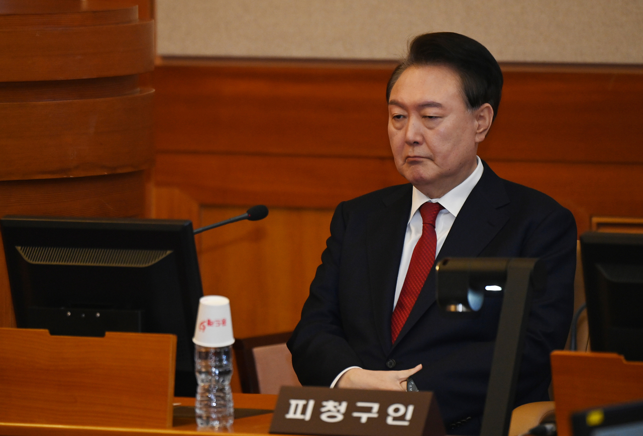 President Yoon Suk Yeol speaks during the sixth formal hearing of his impeachment trial at the Constitutional Court in Seoul on Thursday. (Constitutional Court of Korea)