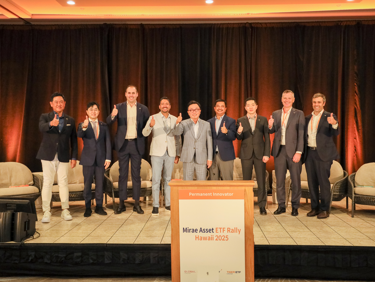 Mirae Asset Group Chairman Park Hyeon-joo (center) and company officials pose for a photo at the Mirae Asset ETF Rally 2025 in Hawaii earlier this month. (Mirae Asset Global Investments)