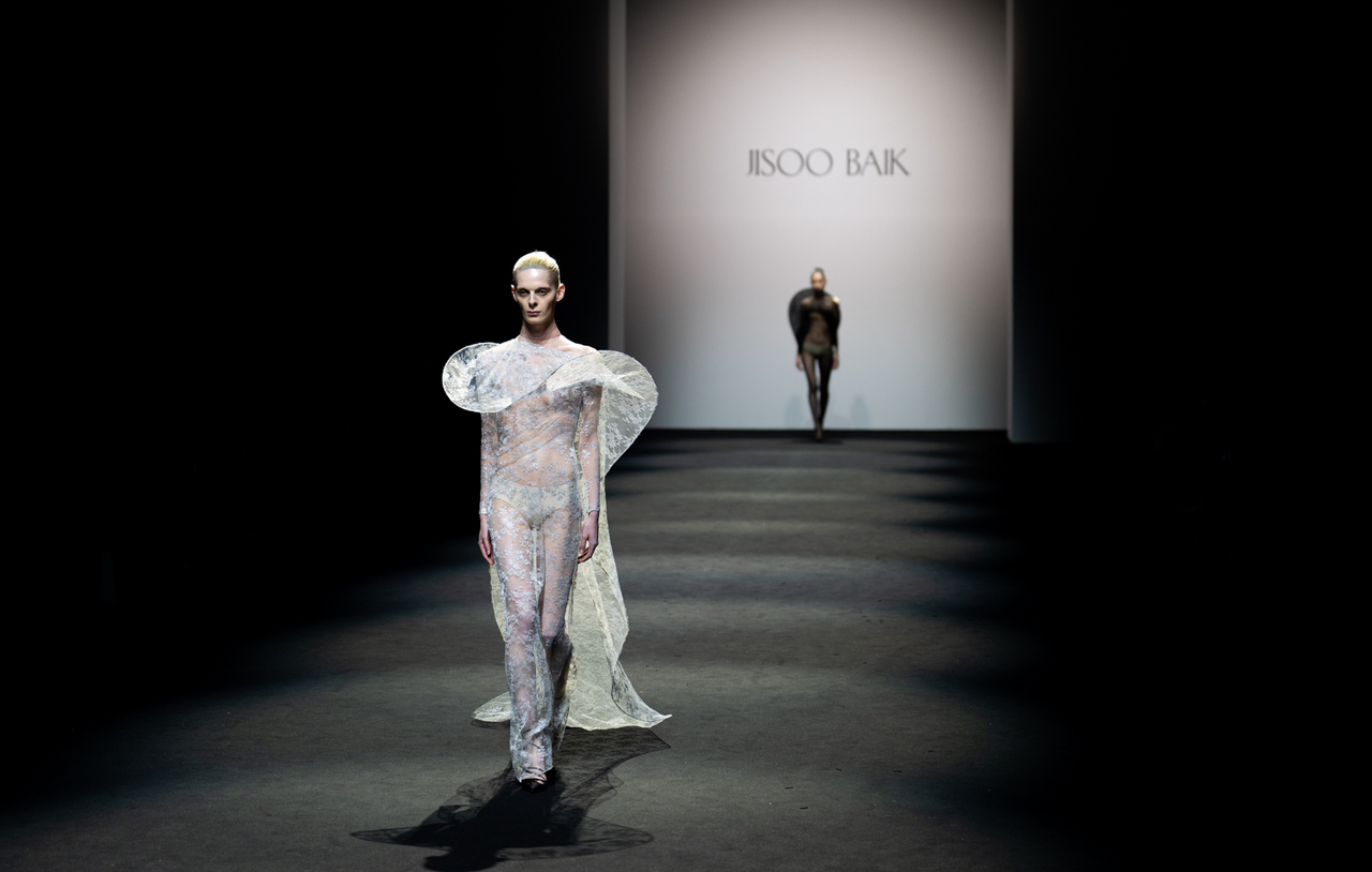 Models wear clothing from Jisoo Baik's collection at 2025 fall-winter Seoul Fashion Week at Dongdaemun Design Plaza in Seoul on Feb. 8. (The Opening)