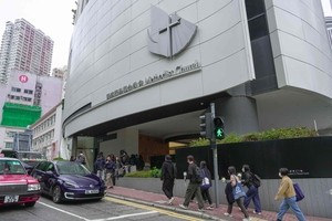 Hundreds mourn Hong Kong champion of prisoners' rights