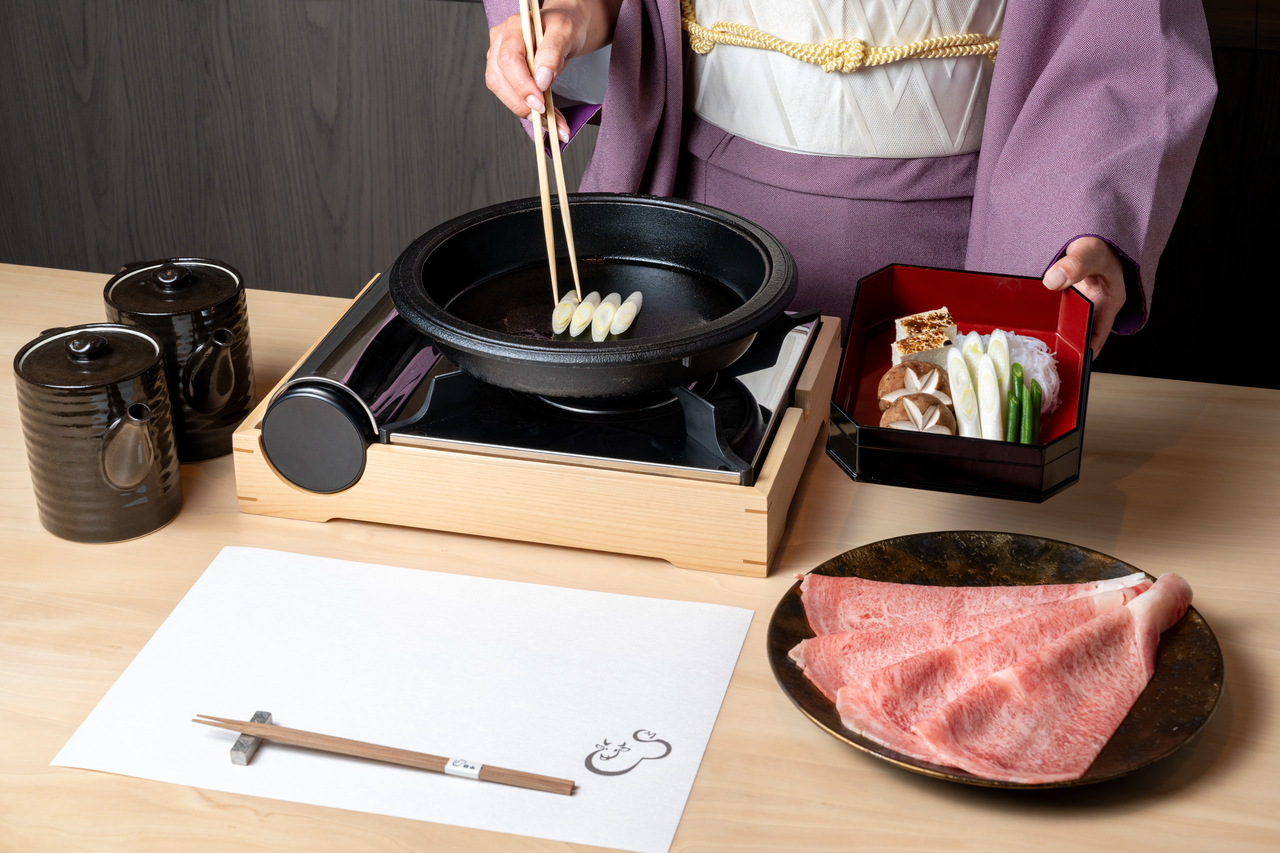Sukiyaki is served at Hiyama. (Hanwha Solutions)