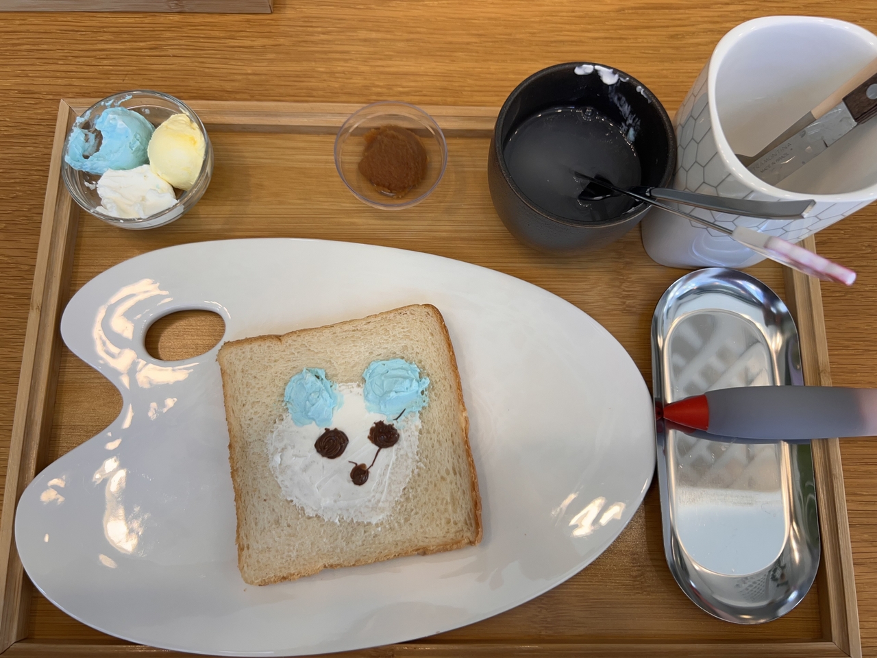 A yogurt bear painted on a canvas of toast (Park Jun-hee/The Korea Herald)