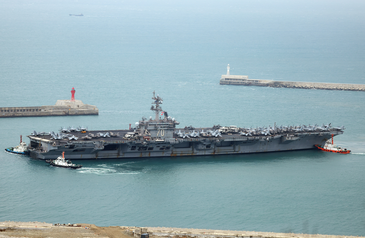 The USS Carl Vinson, an aircraft carrier belonging to the US Navy's Carrier Strike Group 1, arrives at a naval base in Busan, Sunday. (Yonhap)