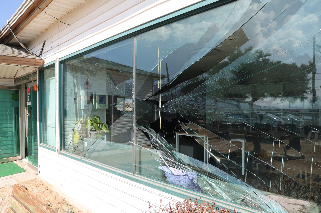 A glass window of a building is seen shattered after a South Korean fighter jet accidentally dropped multiple bombs on a civilian village in Pocheon, Gyeonggi Province, on Thursday.(Yonhap)