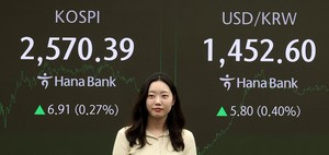 Seoul shares end higher on eased growth concerns