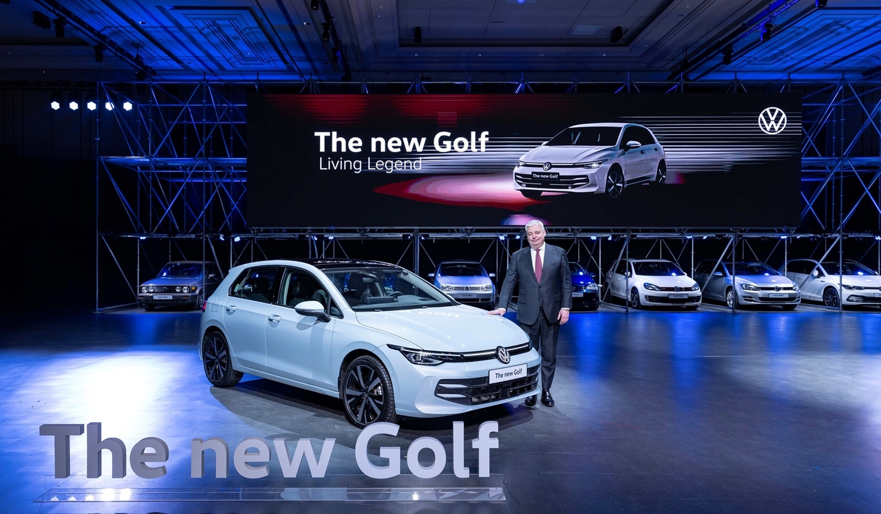 Volkswagen Group Korea CEO Till Scheer poses next to the new Golf at the model's launching event in Incheon on Friday. (Volkswagen Korea)