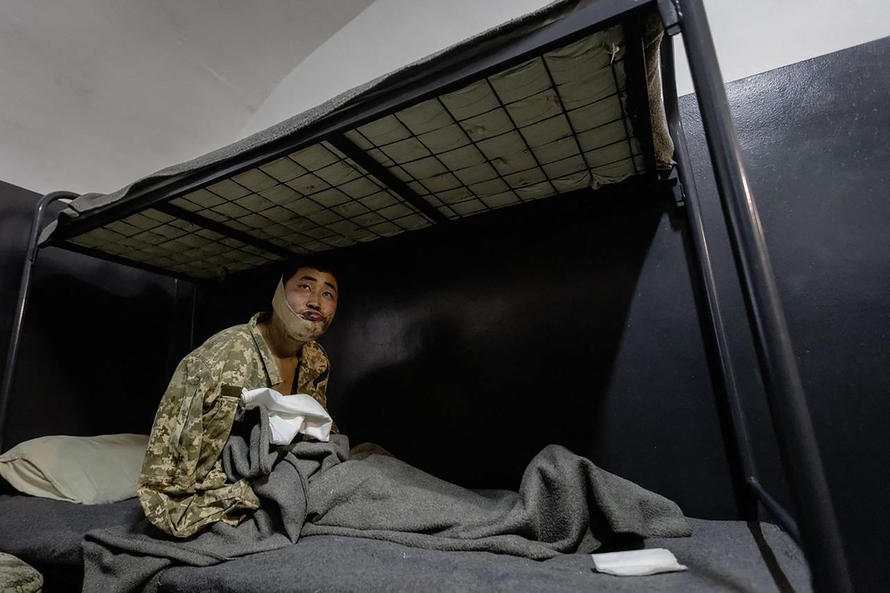An undated handout photograph released on Jan.11, 2025, from Zelenskyy's Telegram account shows an alledged North Korean soldier detained by Ukrainian authorities at an undisclosed location in Ukraine, following his capture by the Ukrainian army. (AFP)