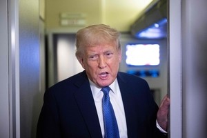 Trump says he will talk to Putin on Tuesday as he pushes for end to Ukraine war