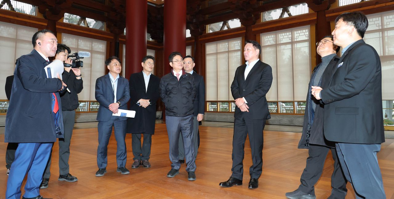 Korea Chamber of Commerce and Industry Chairman Chey Tae-won (third from right) and North Gyeongsang Province Governor Lee Cheol-woo (on Chey's right) inspect the site of the upcoming 2025 APEC CEO Summit in Gyeongju, North Gyeongsang Province, Monday. (KCCI)